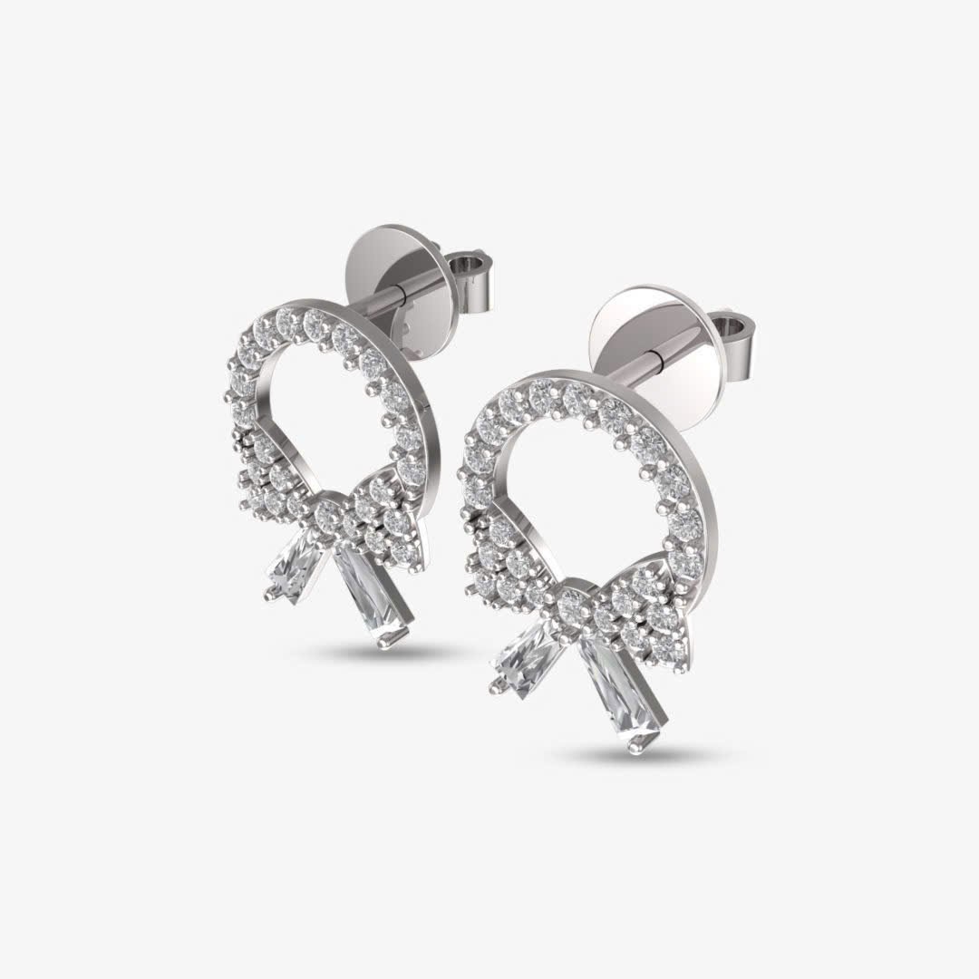 Hình tròn đính đá kết hợp nơ nhỏ tạo nên một thiết kế dễ thương, hiện đại